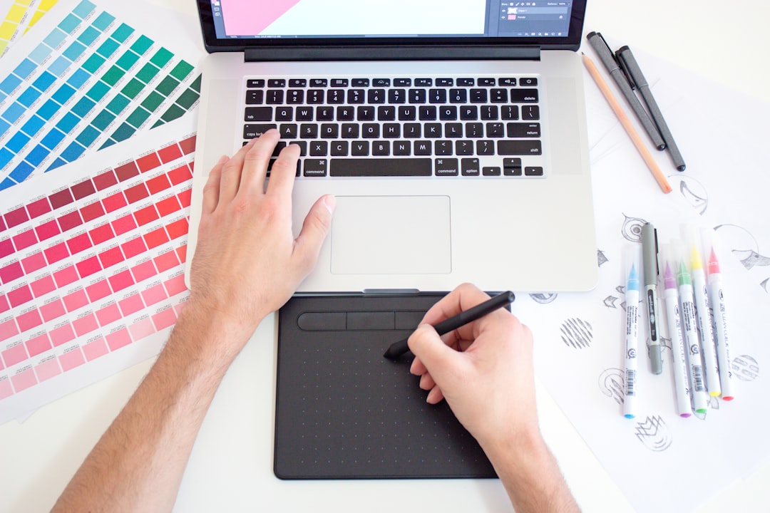 Branding checklist and logo variations on a laptop.